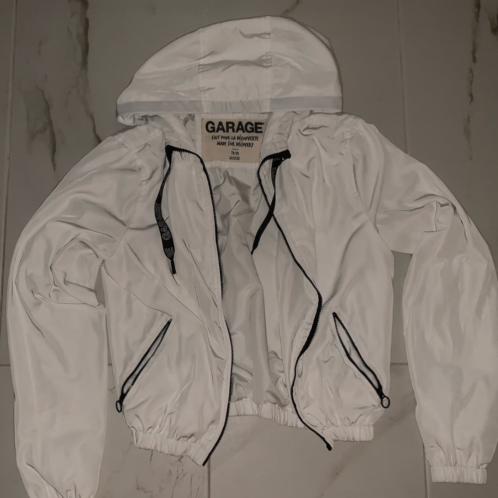 white garage windbreaker